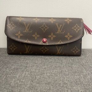 Louis Vuitton Monogram Authentic wallet by Louis Vuitton.